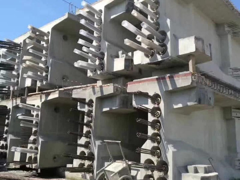 What Are the Criteria for Surface Treatment of Prestressed Steel Strand?  As a supplier specializing in prestressed steel strand production, we understand that choosing the right surface treatment is crucial to ensuring project safety and durability. Drawing on years of experience in service projects, we've summarized the following criteria to help you find the optimal solution:  1. Corrosion Level of the Project Environment  - For dry, non-corrosive environments (such as floor slabs and beams in ordinary buildings): Plain prestressed steel strand is a cost-effective option. The concrete cover alone can meet foundation corrosion protection requirements, making it fully suitable for conventional civil construction. Our plain steel strand boasts a mature process, strong adaptability, and a competitive price-performance ratio. - For humid/mildly corrosive environments (such as bridges and dams): Galvanized prestressed steel strand is an ideal choice. The 80-120μm thick zinc coating provides sacrificial anodic protection, achieving a corrosion life 3-5 times that of ordinary steel strand in salt spray testing, making it easily resistant to rain and water vapor erosion. Our advanced galvanizing process ensures a uniform and durable zinc layer, ensuring guaranteed protection.  - For highly corrosive environments (such as coastal projects, chemical plants, and nuclear power plants): Coated steel strands (such as epoxy-coated or polyethylene-jacketed) are recommended. The epoxy coating (0.6-0.8mm) or polyethylene jacket on these strands physically isolates chloride ions and chemical agents. For example, our epoxy-filled steel strands are guaranteed to resist rust for over 50 years in such environments. Unbonded steel strands also feature a polyethylene jacket with excellent sealing properties and are equally durable, providing reliable protection for the project.  2. Construction Technology (Pre-tensioning/Post-tensioning)  - Pre-tensioning construction (e.g., precast beams and slabs): Prestress is transferred through the bond between the steel strand and concrete. Notched prestressing strands, with circular notches spaced 5-10mm apart, achieve 20%-30% greater adhesion than smooth strands, while maintaining a slippage of less than 1mm, ensuring precise prestress transfer. Our notched strands feature uniform notches and stable bonding, making them particularly suitable for pre-tensioning construction. - Post-tensioning construction (e.g., cast-in-place bridges and large frames): Stress is transferred through anchors, requiring less stringent bond strength. Smooth prestressing strands are sufficient. Their smooth surface allows for easy stranding, shortening construction time and reducing labor costs. Our smooth strands feature a meticulously finished surface, making stranding easier and improving construction efficiency.  3. Project Durability Requirements  - For short-term use or low-maintenance structures (such as temporary supports and low-rise buildings): Plain or galvanized steel strands are sufficient, ensuring foundation durability and meeting the lifespan of the foundation. Our two types of steel strands are of exceptional quality and reliable for short-term use. - For long-term use (design life of 50 years or more) or high-maintenance structures (such as underground utility tunnels and offshore platforms): Coated steel strands with enhanced corrosion resistance can be selected. For example, our monofilament epoxy steel strands have undergone aging testing and provide long-term protection in harsh environments, ensuring the project lifespan perfectly matches design expectations and reducing maintenance hassles.  In general, the selection process should consider environmental corrosion, construction process, and durability requirements. We will develop a suitable solution for your project at no charge, ensuring the selected strand meets your project requirements. Feel free to contact us with any questions. We will do our best to provide satisfactory products and services, and provide professional solutions to safeguard your project!